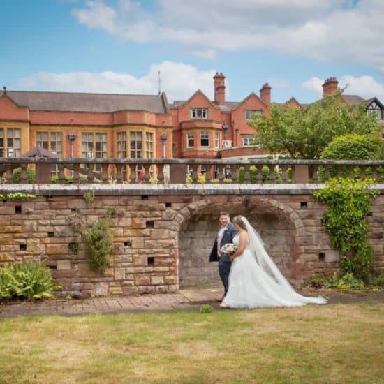 Bride and groom in garden